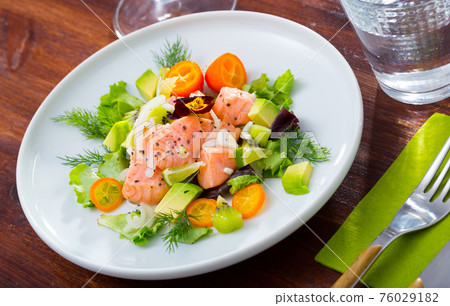 Ceviche of trout with avocado, cumquat, greens 76029182