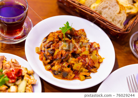 Turkish food saksuka with eggplant with tomatoes 76029244