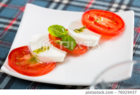 Fresh italian caprese salad 76029437
