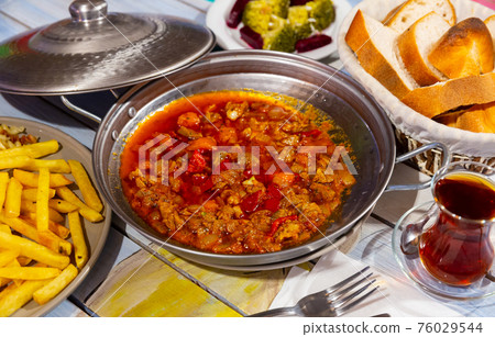 The delicious hot dish is called Saute in Turkish (Et Sote). The delicious hot dish is called Saute in Turkish (Et Sote). 76029544