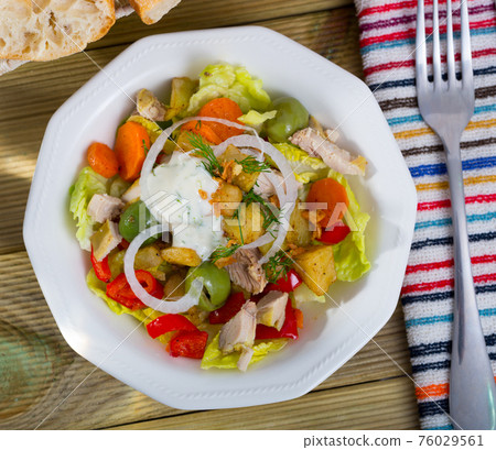 Top view of warm salad with chicken and eggplant Top view of warm salad with chicken and eggplant 76029561