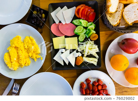 Rich and delicious Turkish breakfast on hotel table without people 76029802