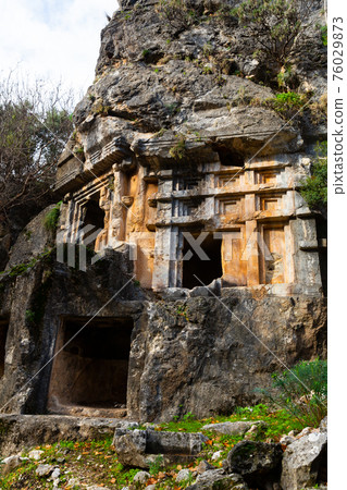 Lycian rock-cut tombs in ancient Pinara, Turkey 76029873