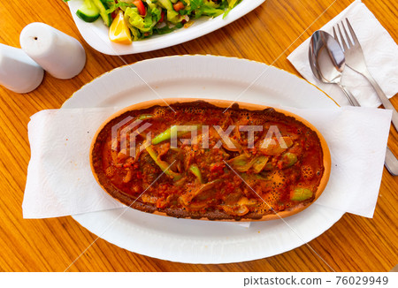 Izmir kofte, turkish dish of spicy meatballs 76029949