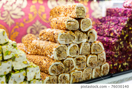 Turkish lokum with nougat, fruits and pistachios for sale 76030140