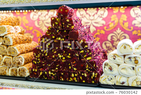 Turkish lokum with nougat, fruits and pistachios for sale 76030142