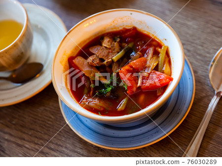 Traditional Laghman with pulled noodles, meat and vegetables Traditional Laghman with pulled noodles, meat and vegetables 76030289