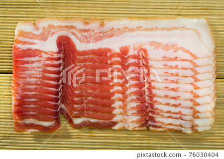 Slices of jamon or traditional spanish panceta curada Slices of jamon or traditional spanish panceta curada 76030404
