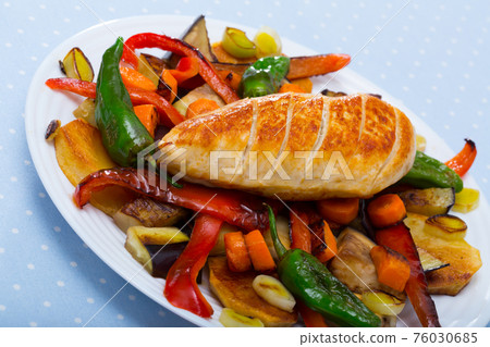 Baked vegetables with chicken breast Baked vegetables with chicken breast 76030685