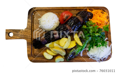 Traditional Turkish Patlicanli kebap from eggplant and minced lamb Traditional Turkish Patlicanli kebap from eggplant and minced lamb 76031011
