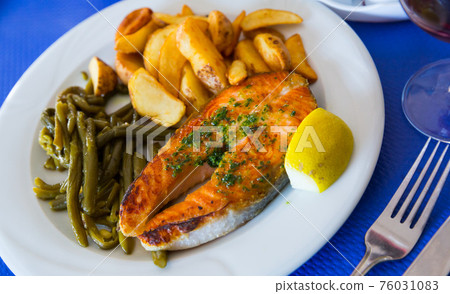 Grilled salmon with vegetables Grilled salmon with vegetables 76031083