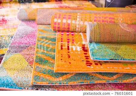 Various colorful wool rugs for sale at store Various colorful wool rugs for sale at store 76031601