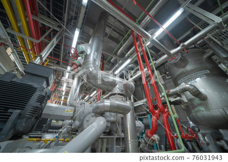 Ceiling of Industry factory. Chiller tower or cooling tower in building. System work machine. Condenser Water Supply and return pipe lines. Ventilation compressor. Water system in workshop. 76031943