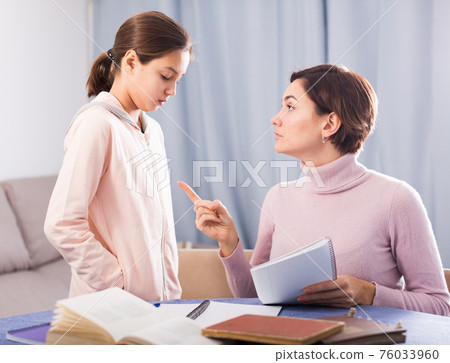 Mother teaches daughter Mother teaches daughter 76033960