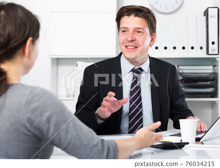 Young smiling man with companion Young smiling man with companion 76034215