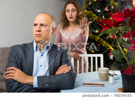 Couple quarreling at home Couple quarreling at home 76034585