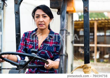 woman forklift worker operator 76034738