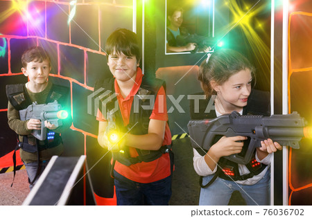Glad girl aiming laser gun at other players Glad girl aiming laser gun at other players 76036702