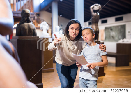 Family visiting historical museum 76037659