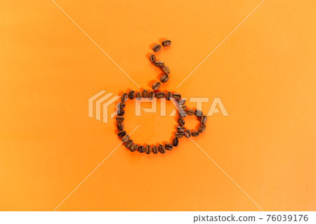 Coffee beans on paper background Coffee beans on paper background 76039176