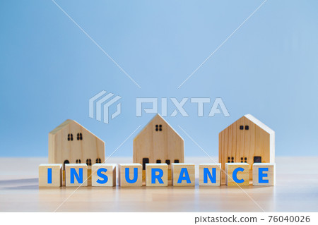 Text "INSURANCE" on wooden block and house model, Property home insurance protection, family house, concept. Text "INSURANCE" on wooden block and house model, Property home insurance protection, family house, concept. 76040026