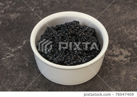 Luxury strugeon fish black caviar Luxury strugeon fish black caviar 76047409