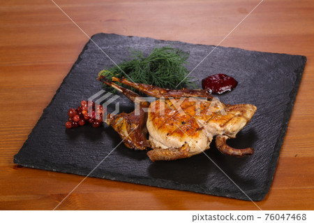 Grilled chicken with cranberry sauce Grilled chicken with cranberry sauce 76047468