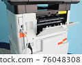 photocopier is a machine that makes paper copies of documents and other visual images ,close-up multi-function device, printer scanner, copier. 76048308