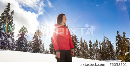 Adventure Woman Hiking on top of Canadian Mountains Adventure Woman Hiking on top of Canadian Mountains 76058501