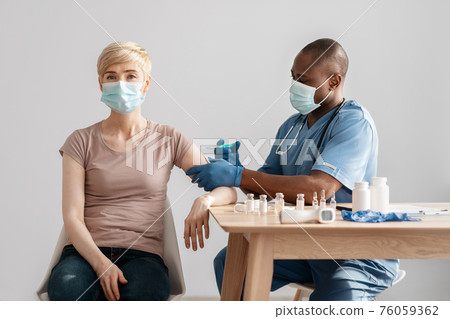Prevent covid-19 outbreak, vaccination population campaign in modern clinic Prevent covid-19 outbreak, vaccination population campaign in modern clinic 76059362