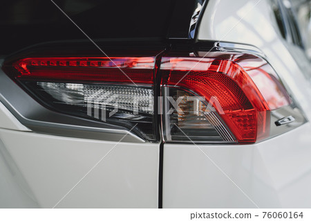 Detail of a beauty and fast car with headlight Detail of a beauty and fast car with headlight 76060164