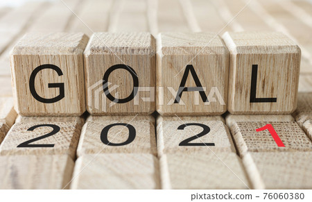 Wooden blocks with words 2021 goal on them 76060380