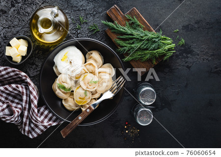 Pelmeni, meat stuffed boiled dumplings Pelmeni, meat stuffed boiled dumplings 76060654