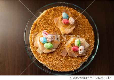 Easter cake with yellow mirror glaze, chocolate. 76060712