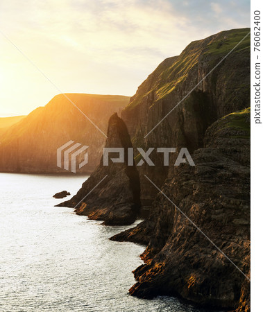 Famous cliff near Sorvagsvatn lake on Vagar island Famous cliff near Sorvagsvatn lake on Vagar island 76062400