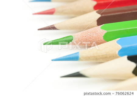 Set of color pencils isolated on a white. Macro shot. Selective focus. 76062624
