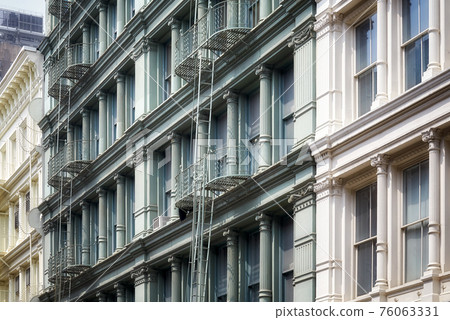 Row of old buildings with iron fire escapes, New York City, USA. Row of old buildings with iron fire escapes, New York City, USA. 76063331