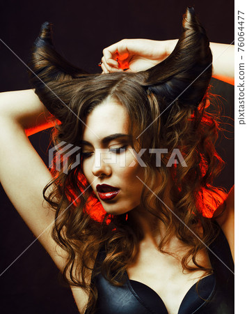 bright mysterious woman with horn hair, halloween celebration bright mysterious woman with horn hair, halloween celebration 76064477