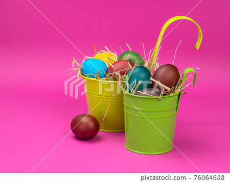 Bright Easter still life on a pink background. Bright Easter still life on a pink background. 76064688