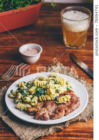 Pork Neck Steak with Creamy Spinach Pasta 76064741