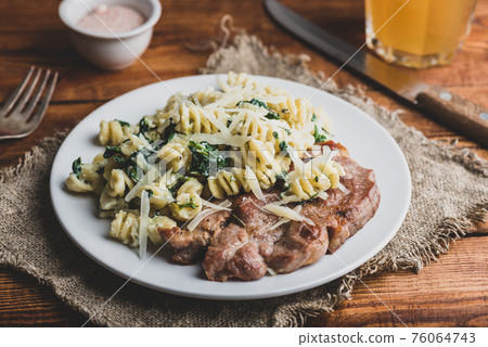 Pork Neck Steak with Creamy Spinach Pasta 76064743