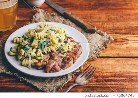 Pork Neck Steak with Creamy Spinach Pasta 76064745