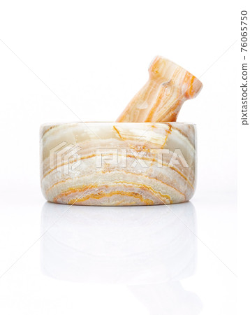 Closeup marble mortar and pestle isolated on white background . 76065750