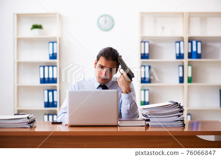 Depressed male employee committing suicide at workplace Depressed male employee committing suicide at workplace 76066847