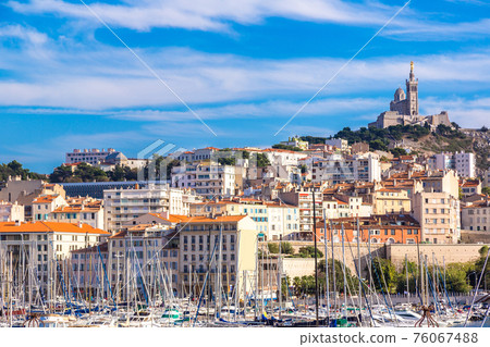 Notre Dame de la Garde and olf port in Marseille, France 76067488
