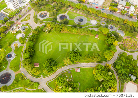 green and funny park at a city green and funny park at a city 76071183