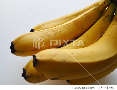 Yellow banana with white background Yellow banana with white background 76071860
