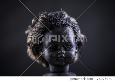 Creepy doll in the dark 76073770
