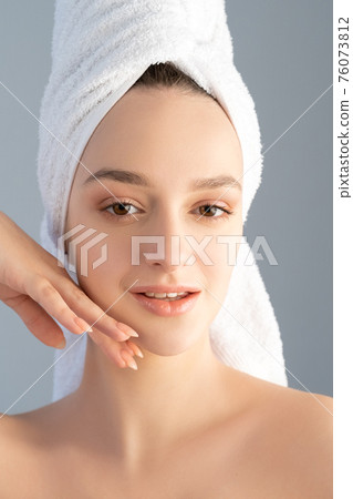 beauty care facial treatment woman touching skin beauty care facial treatment woman touching skin 76073812