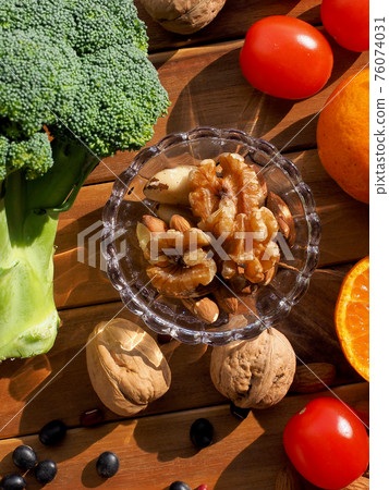 Fresh organic vegetables, fruits and nuts 76074031